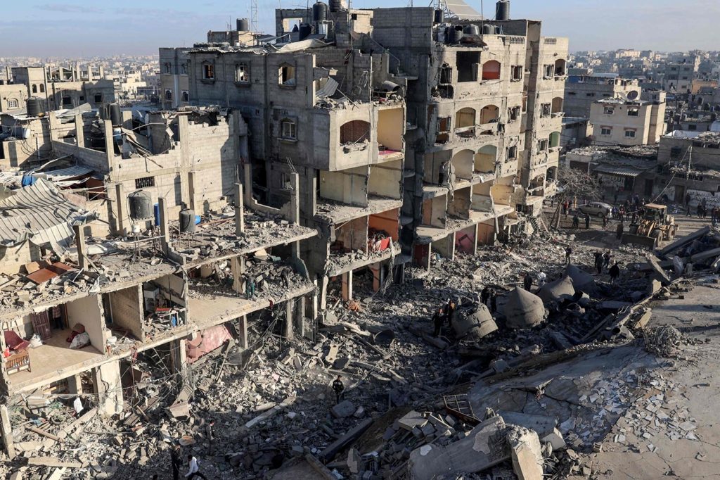 TOPSHOT - A general view shows destroyed building and the rubble of the al-Faruq mosque on February 22, 2024, following an overnight Israeli air strike in Rafah refugee camp in the southern Gaza Strip, amid continuing battles between Israel and the Palestinian militant group Hamas. (Photo by SAID KHATIB / AFP)